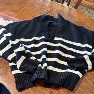 Sweater is Brand new and is a crop sweater.  Very warm and casual!